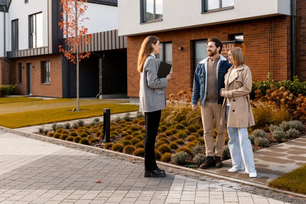 real-estate-agent-showing-new-modern-townhouses-to-2026-03-26-23-07-10-utc